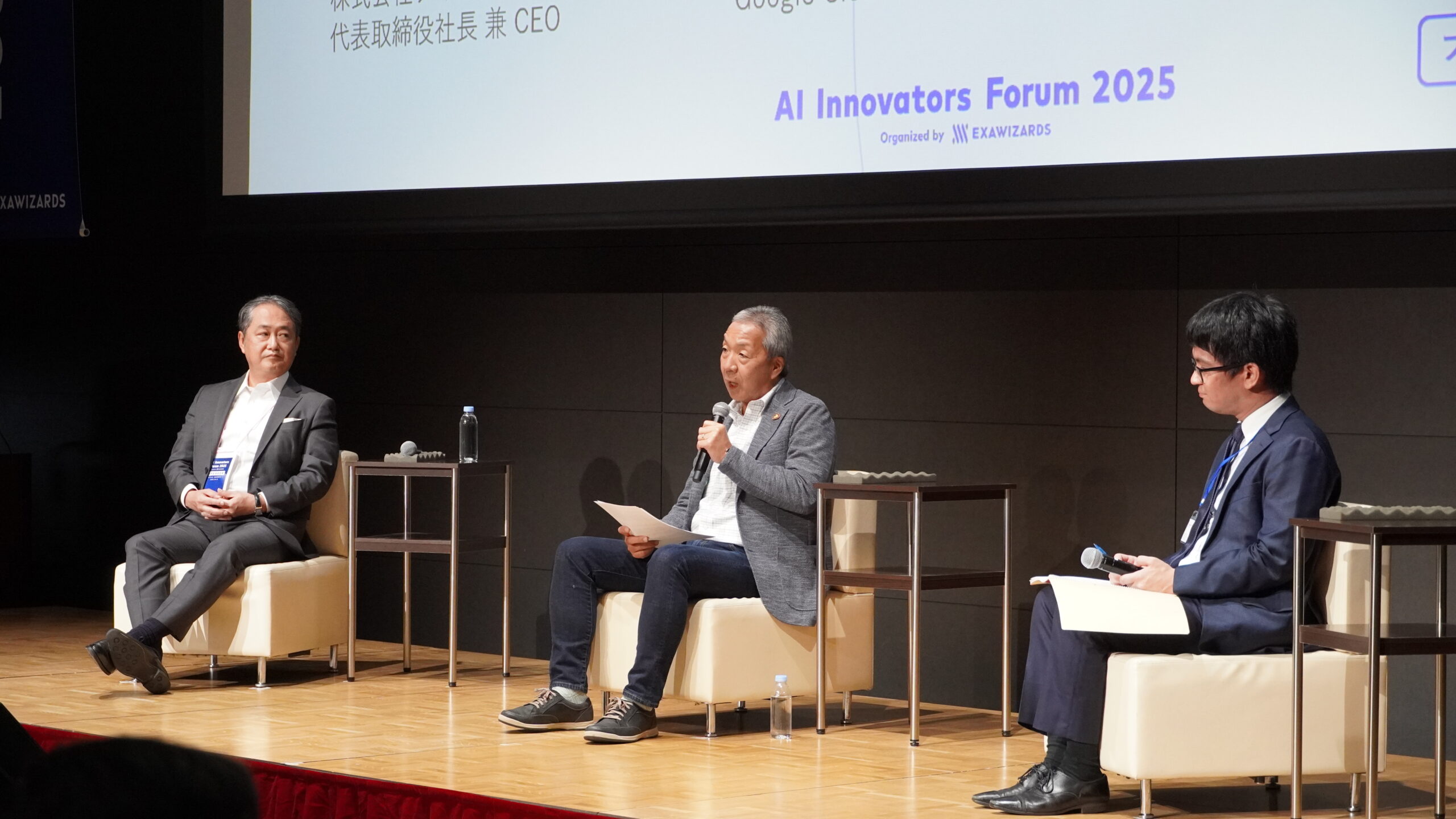 写真：左から、株式会社ディー・エヌ・エー 代表取締役社長 兼 CEO 岡村信悟氏、グーグル・クラウド・ジャパン合同会社 Google Cloud VP 兼 エグゼクティブ アドバイザー 平手 智行氏、株式会社エクサウィザーズ 常務取締役COO 大植択真